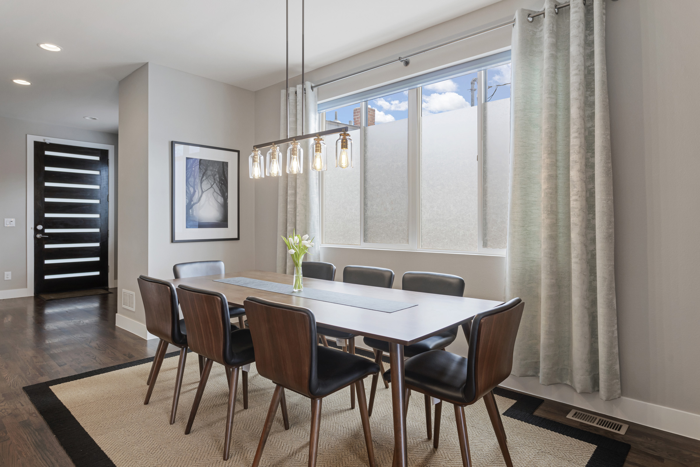 Modern gourmet kitchen with island and gas range