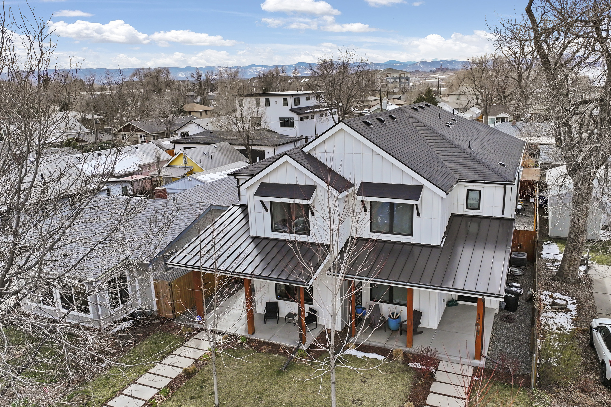 Aerial view of home and neighborhood