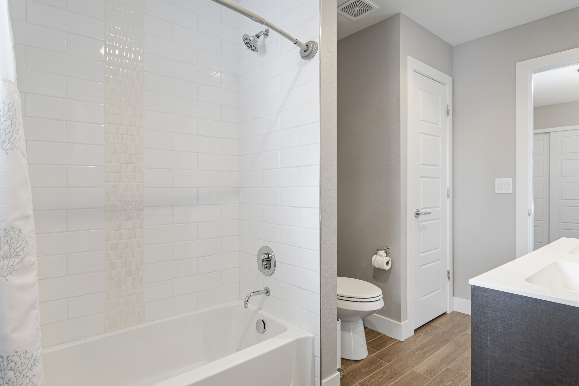 Bathroom with tub and shower