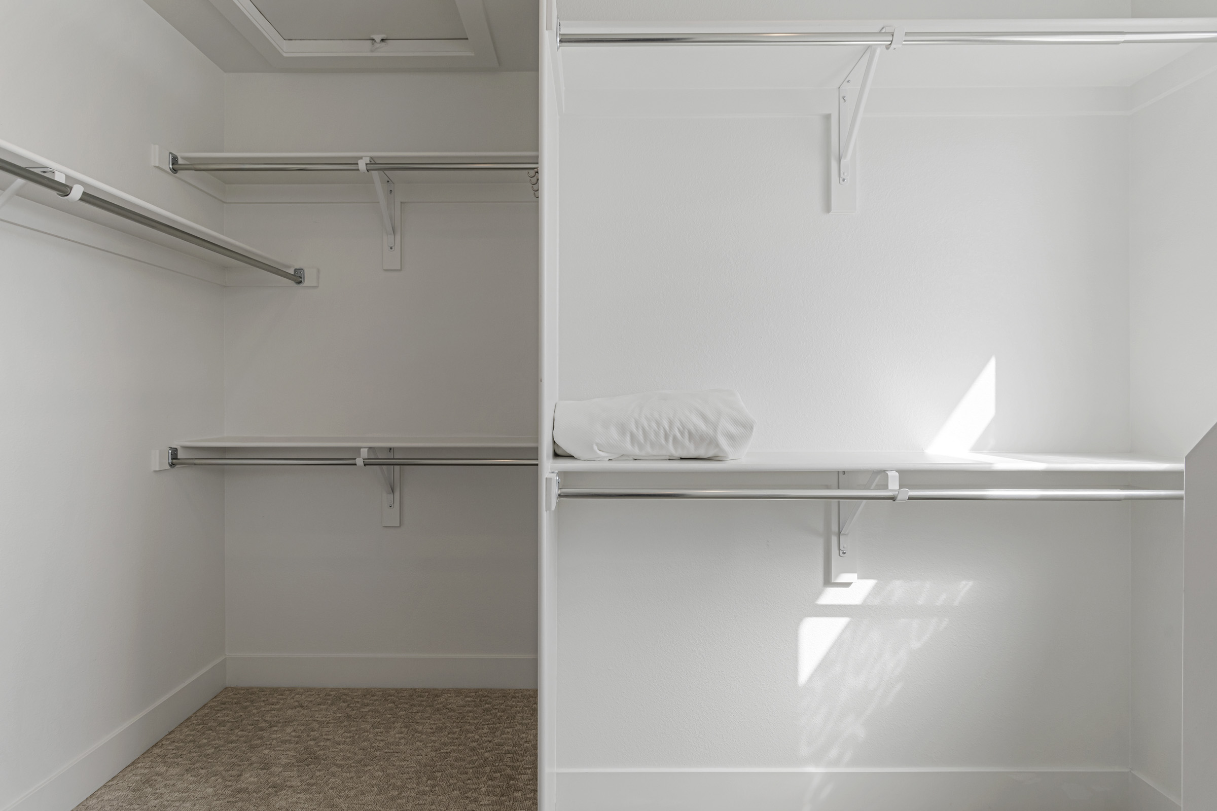 Secondary bedroom with upholstered headboard